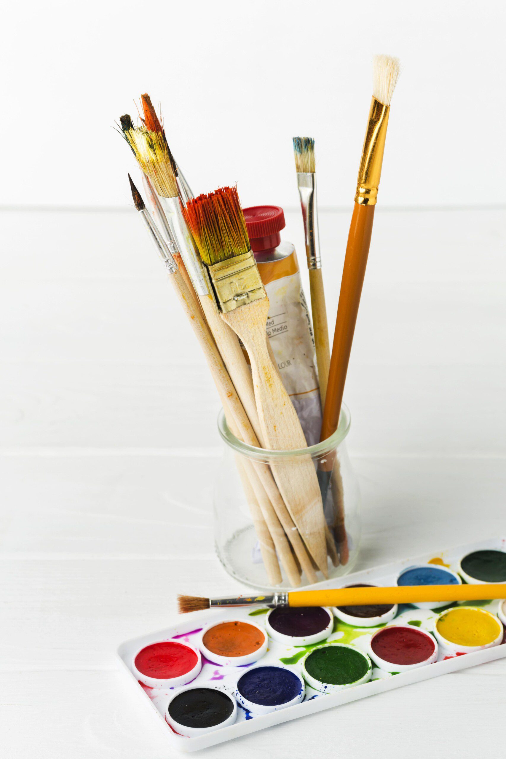 front-view-glasses-with-paint-brushes art class